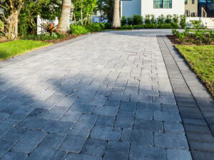 two cobble pattern driveway by accurate pavers
