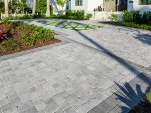 two cobble pattern driveway by accurate pavers