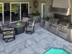 porcelain pavers pool deck and outdoor kitchen