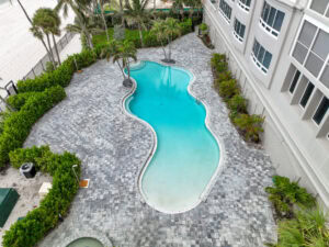 arial photograph of paved pool deck in naples