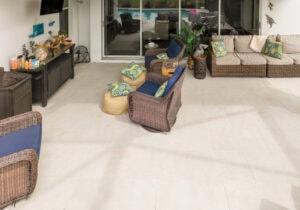 a pool deck done in staggered running pattern porcelain tile