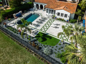 aerial photo of a porcelain pool deck by accurate pavers