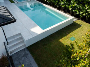 pool deck by accurate pavers and bellamia development