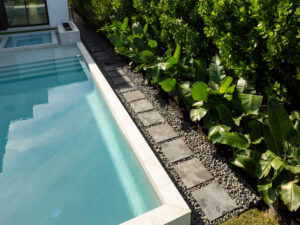 pool walkway in travertine by accurate pavers