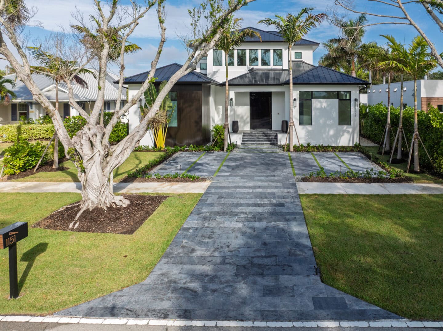 travertine driveway by accurate pavers in Naples Florida