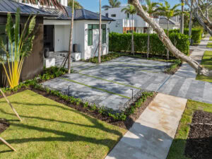 front of the house driveway with turf inserts by naples paver contractor