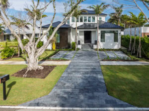 travertine driveway by accurate pavers in Naples Florida
