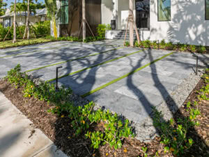 front of the house driveway with turf inserts by accurate pavers