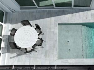 outdoor pool area paved by accurate pavers