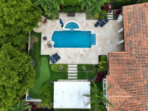 aerial photo of a pool deck by accurate pavers