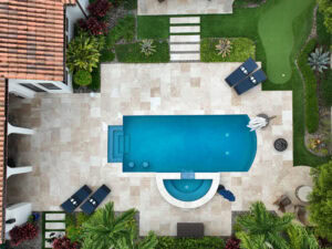 aerial photo of a pool deck by accurate pavers