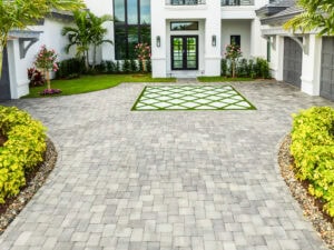 turf in driveway by accurate pavers