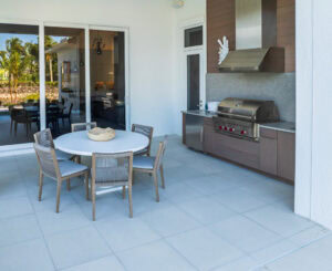 outdoor pool deck paved with porcelain tilesby accurate pavers