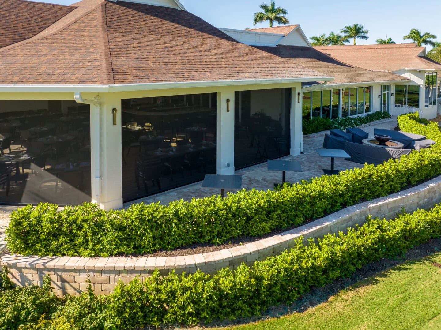 paved retaining wall with landscaping