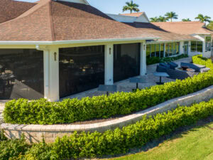 paved retaining wall with landscaping