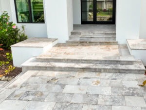paved Stone steps leading to a doorway