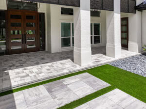 home entrance paved by accurate pavers