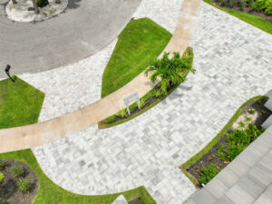 Paved driveway with greenery