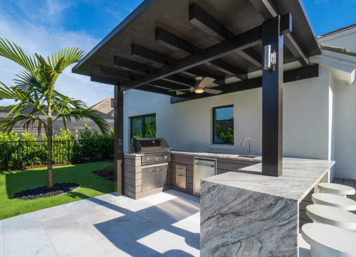 outside cooking patio desing by accurate pavers