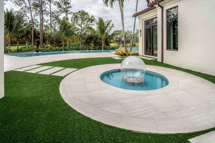 artistic and creative circle pool deck by accurate pavers