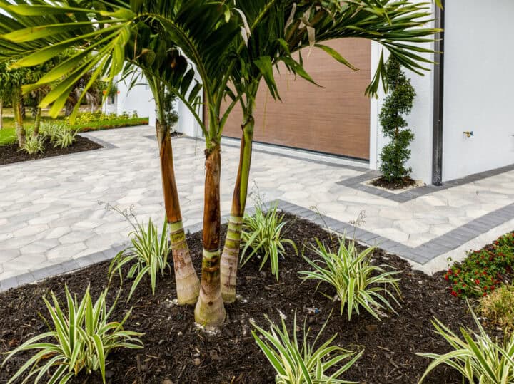 paved walkway near garage